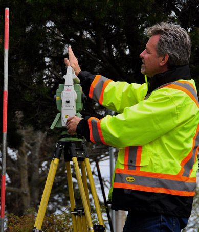 Construction Engineer taking measurements